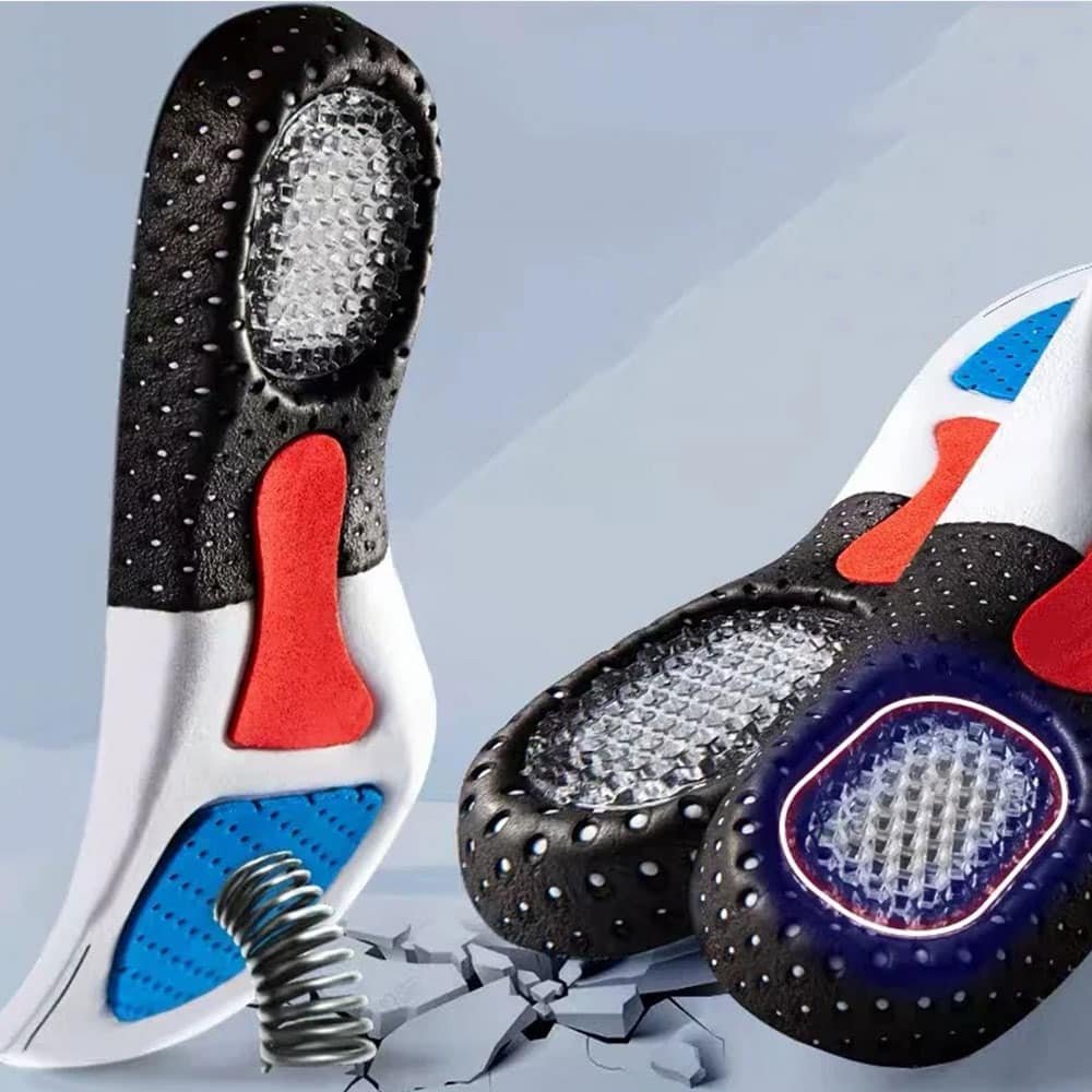 Shock absorbing insoles with arch support